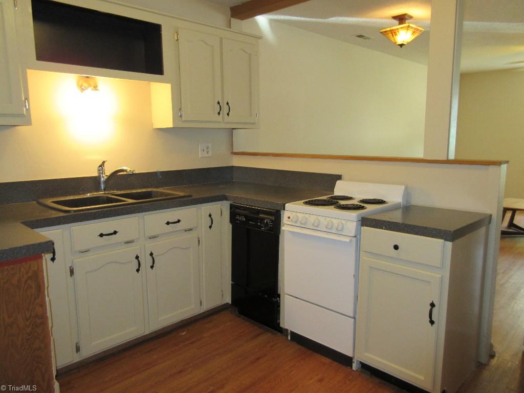 245 Hampton Road, Unit 3B Asheboro, NC 27203 - Photo 8 of 18 Compact kitchen hides the mess while entertaining!