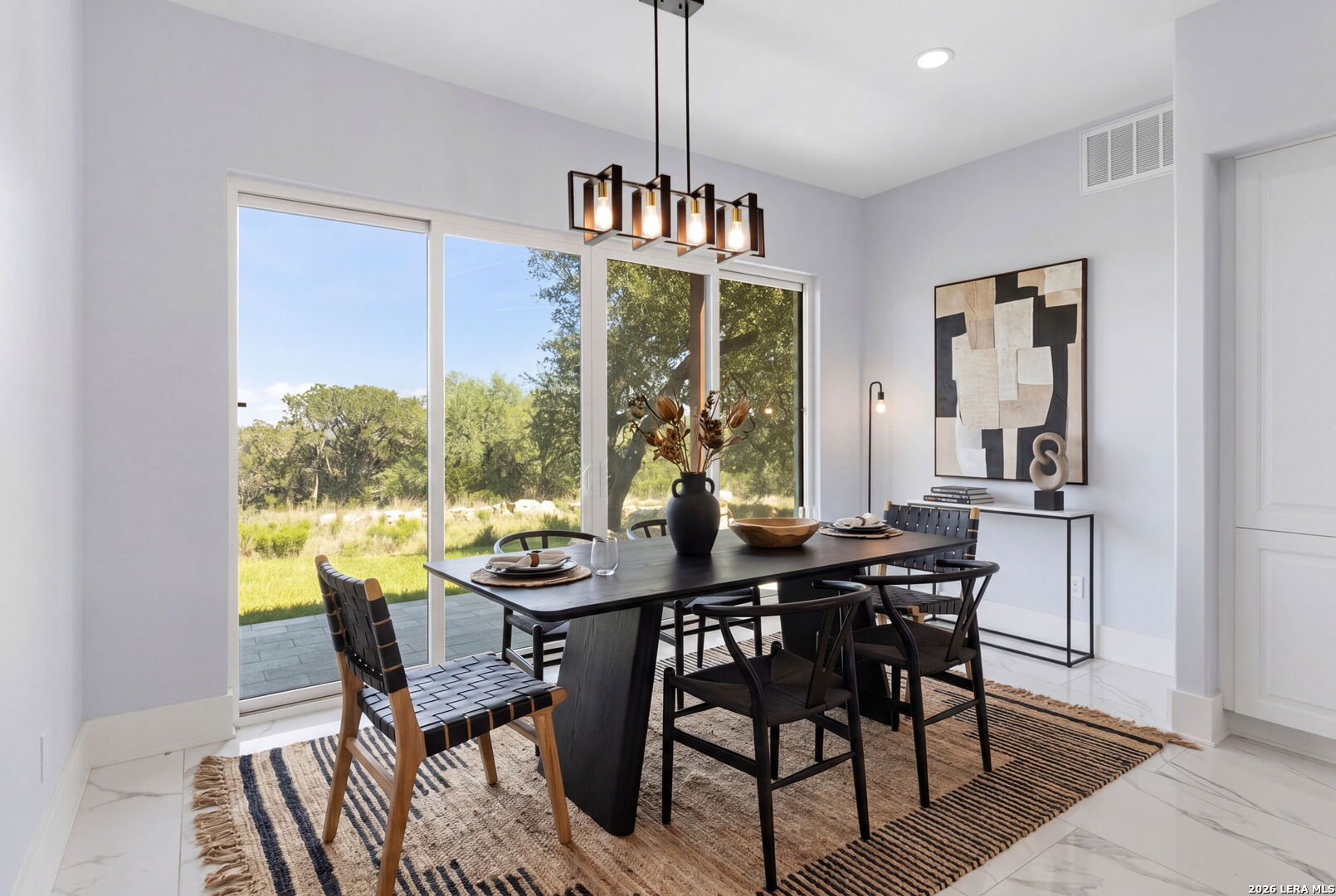 1054 Star Ridge Spring Branch, TX 78070 - Photo 12 of 31 a view of a dining room with furniture window and outside view