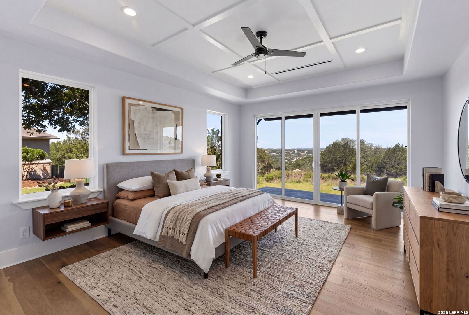 1054 Star Ridge Spring Branch, TX 78070 - Photo 13 of 31 a bedroom with a large bed and a large window
