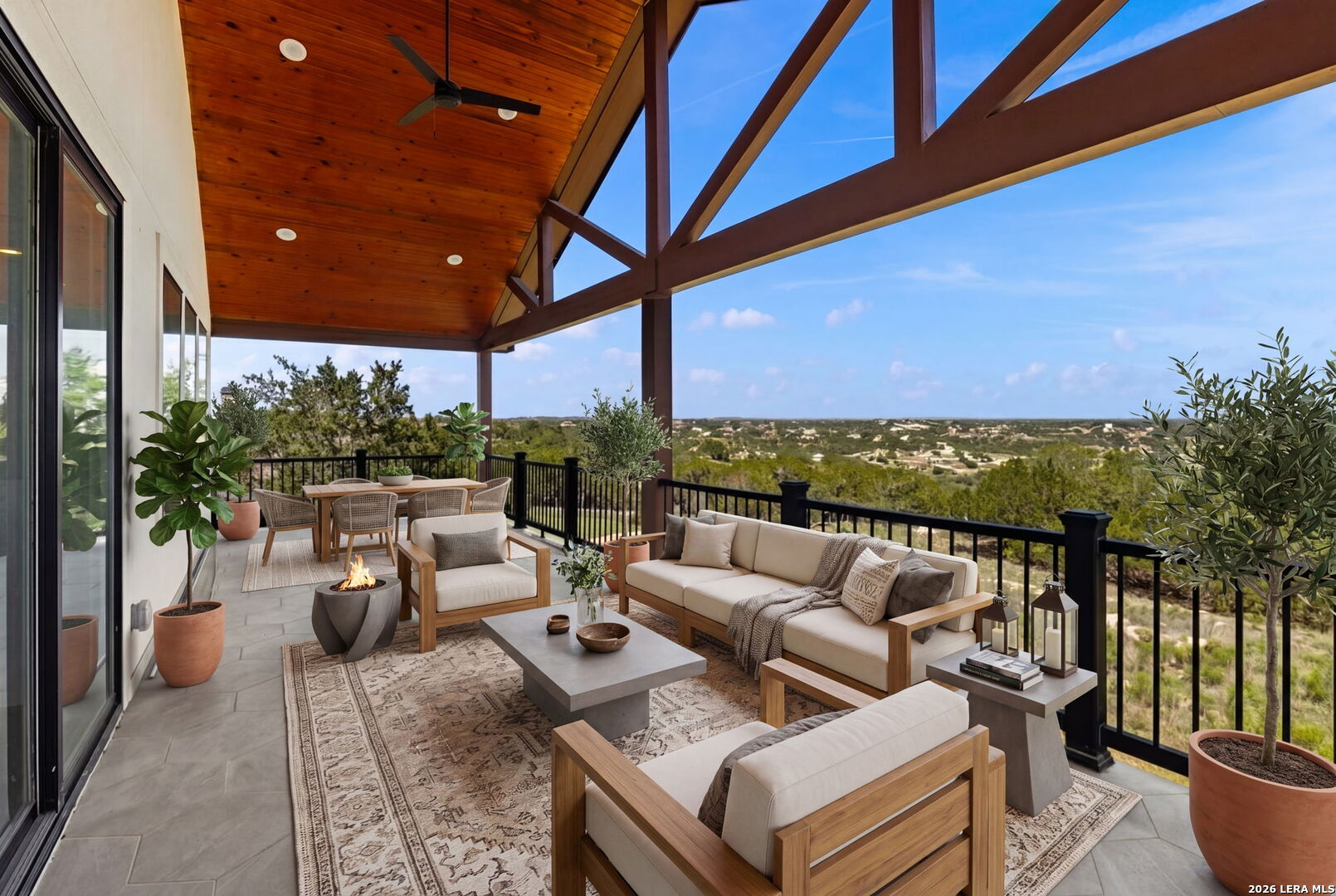 1054 Star Ridge Spring Branch, TX 78070 - Photo 22 of 31 a view of a patio with couches and potted plants