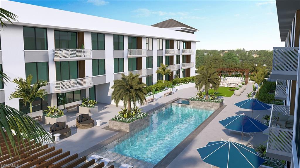 4936 Tamiami Trail East, Unit 221 Naples, FL 34113 - Photo 3 of 11 a view of a house with backyard and sitting area