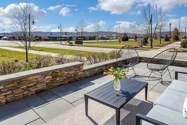 a view of a swimming pool with a lounge chairs