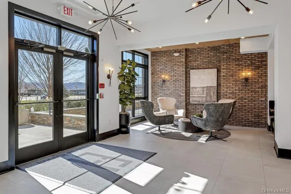 a front view of building with yard