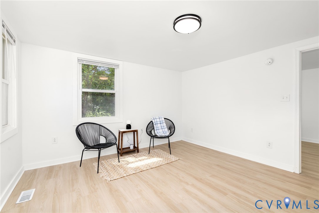 27523 Flank Road Petersburg, VA 23805 - Photo 5 of 34 Bright interior space featuring light wood-finish