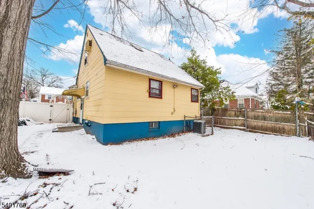 a view of back yard of the house
