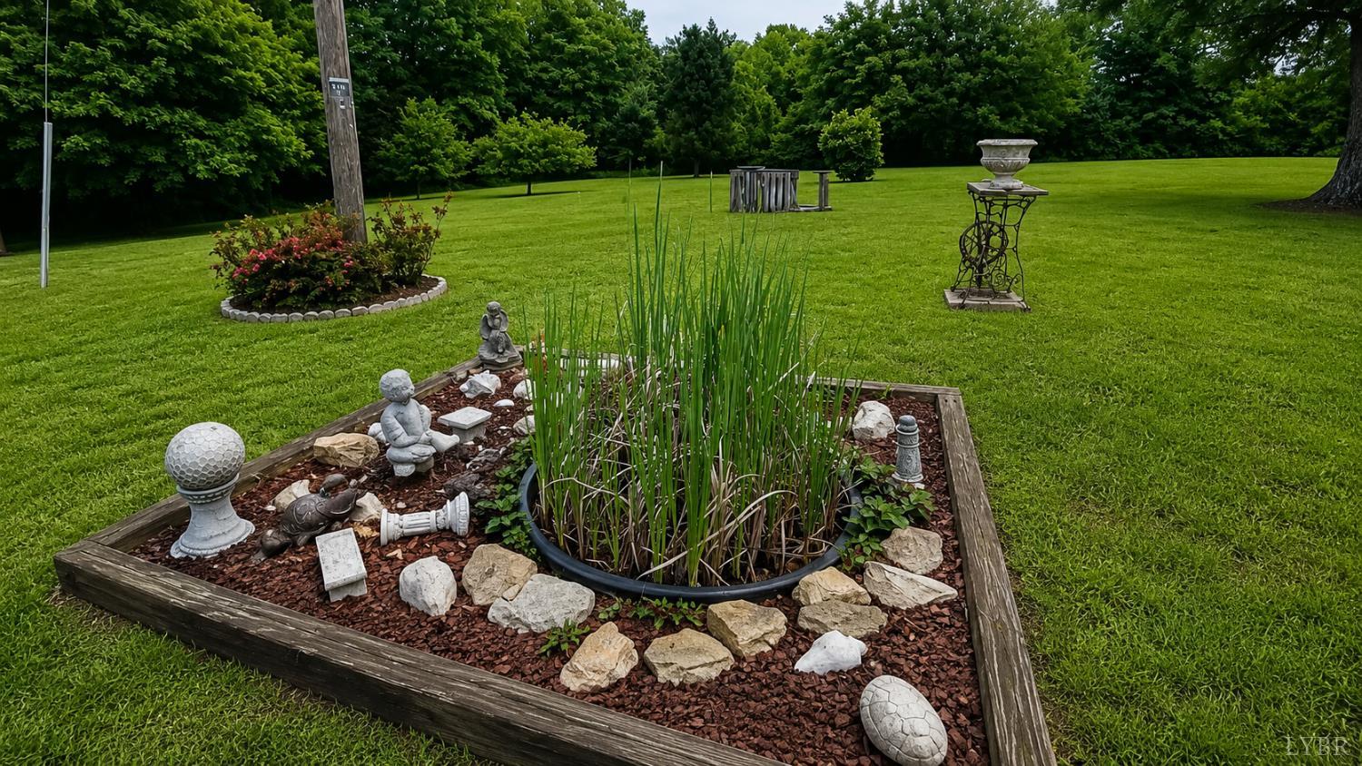 2346 Mitchell Mill Road Gladys, VA 24554 - Photo 27 of 38 a garden view with a sitting space