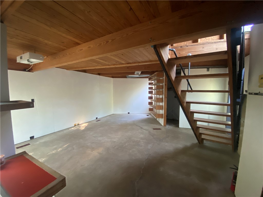 608 West 27th Street Bryan, TX 77803 - Photo 28 of 39 Unfinished below grade area featuring stairway
