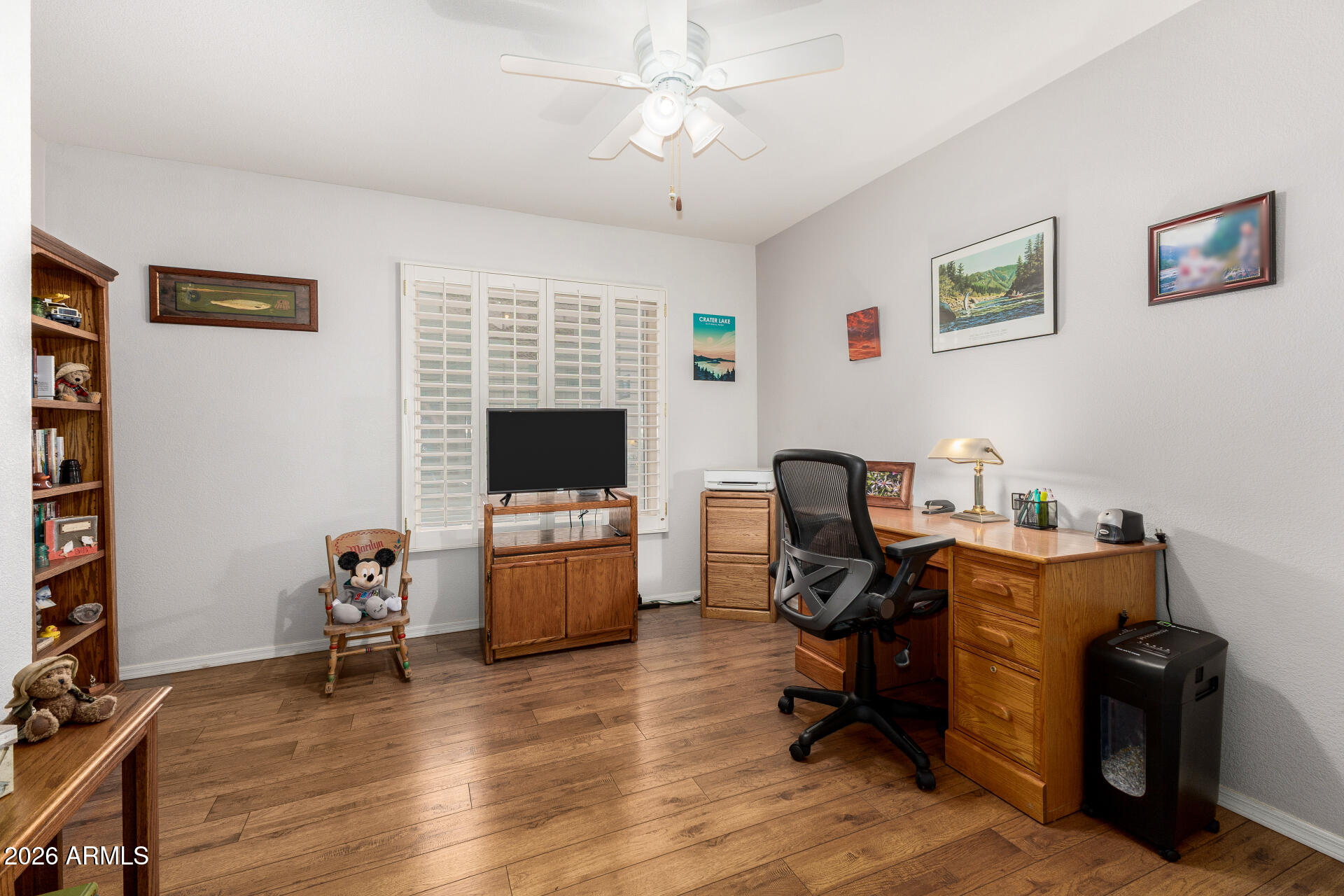 8302 West Marco Polo Road Peoria, AZ 85382 - Photo 13 of 30 a view of a workspace with furniture and a window