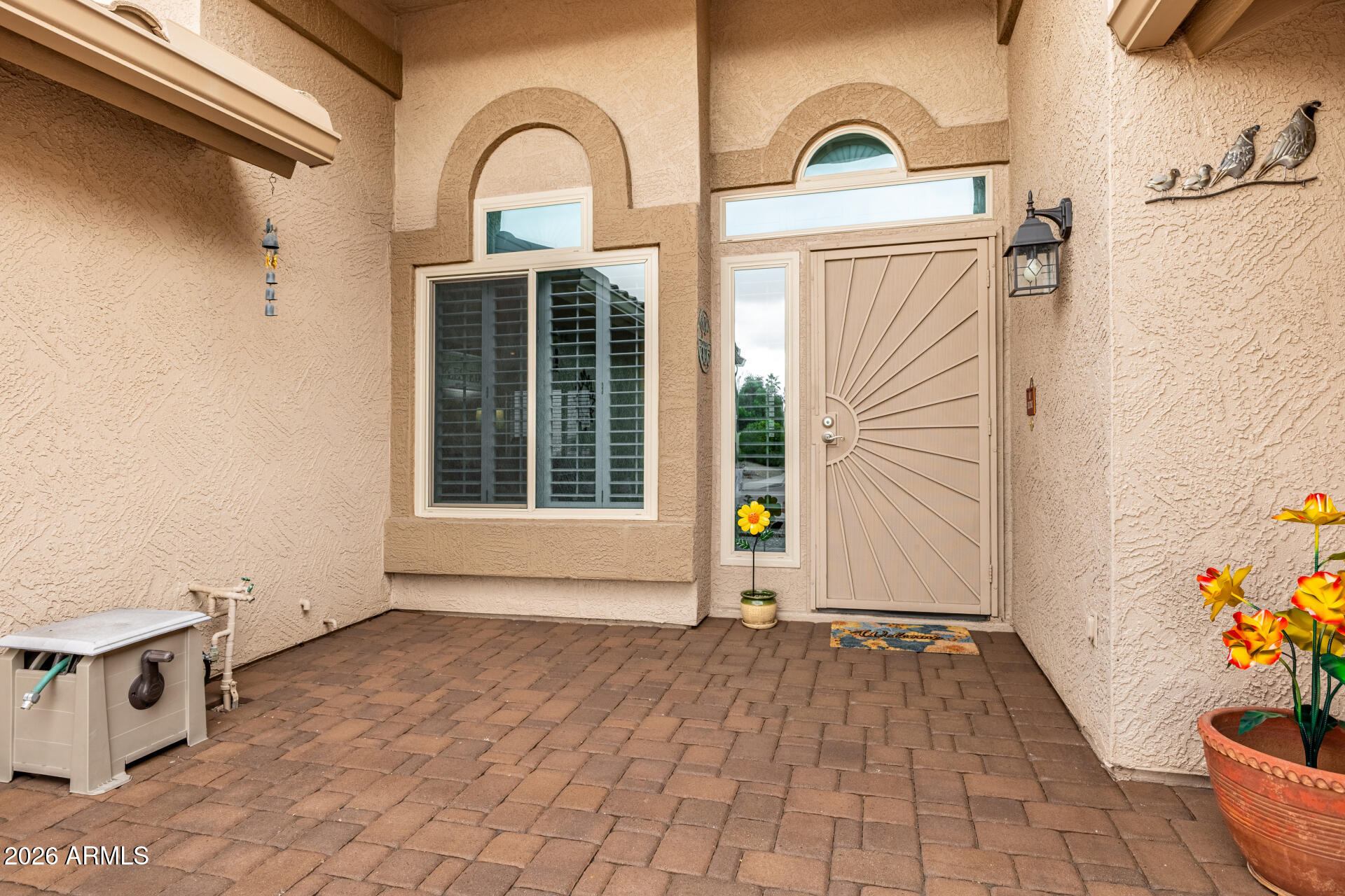 8302 West Marco Polo Road Peoria, AZ 85382 - Photo 2 of 30 a view of a storage & utility room with a window