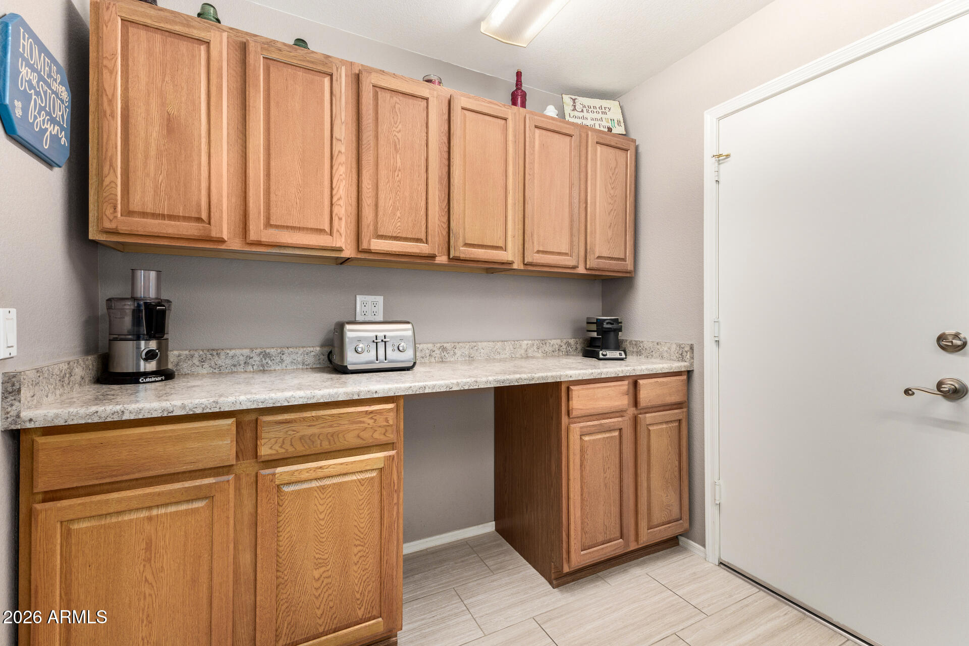 8302 West Marco Polo Road Peoria, AZ 85382 - Photo 25 of 30 a kitchen with stainless steel appliances granite countertop a refrigerator and cabinets