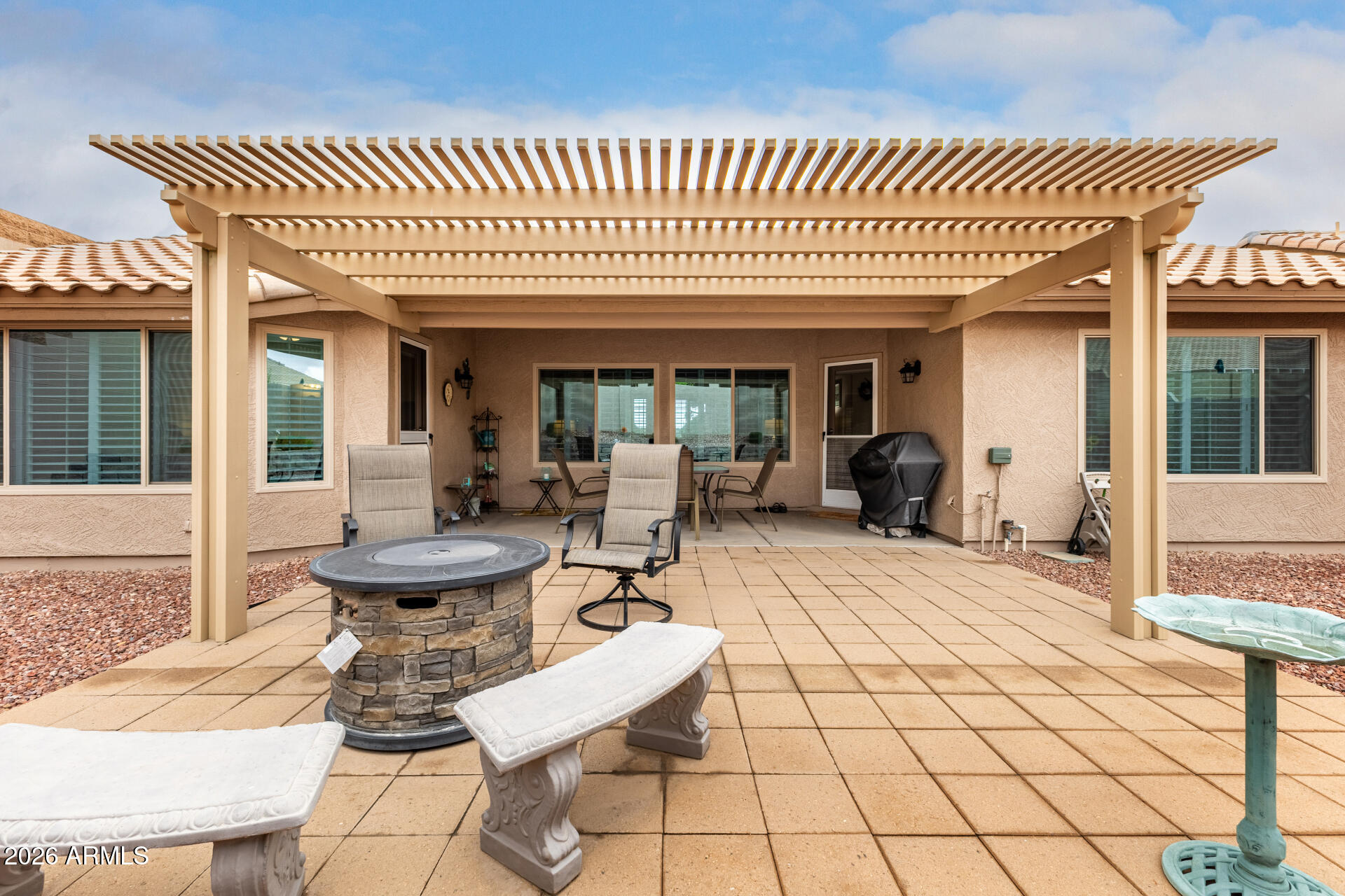 8302 West Marco Polo Road Peoria, AZ 85382 - Photo 27 of 30 a view of a patio with table and chairs