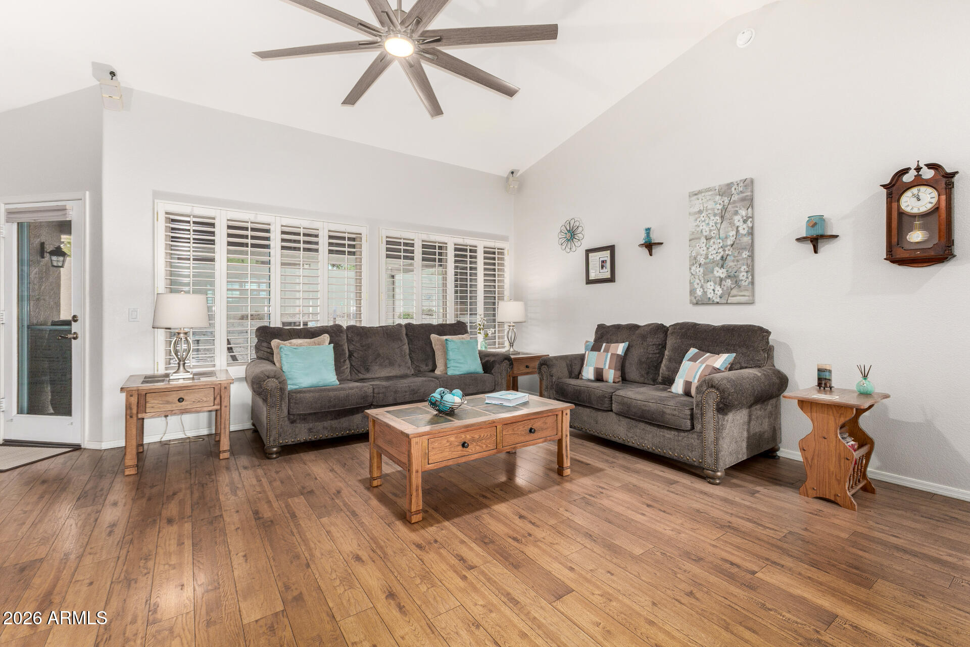 8302 West Marco Polo Road Peoria, AZ 85382 - Photo 4 of 30 a living room with furniture and a large window