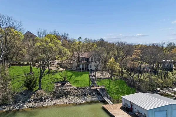 a view of a lake with a building in the background