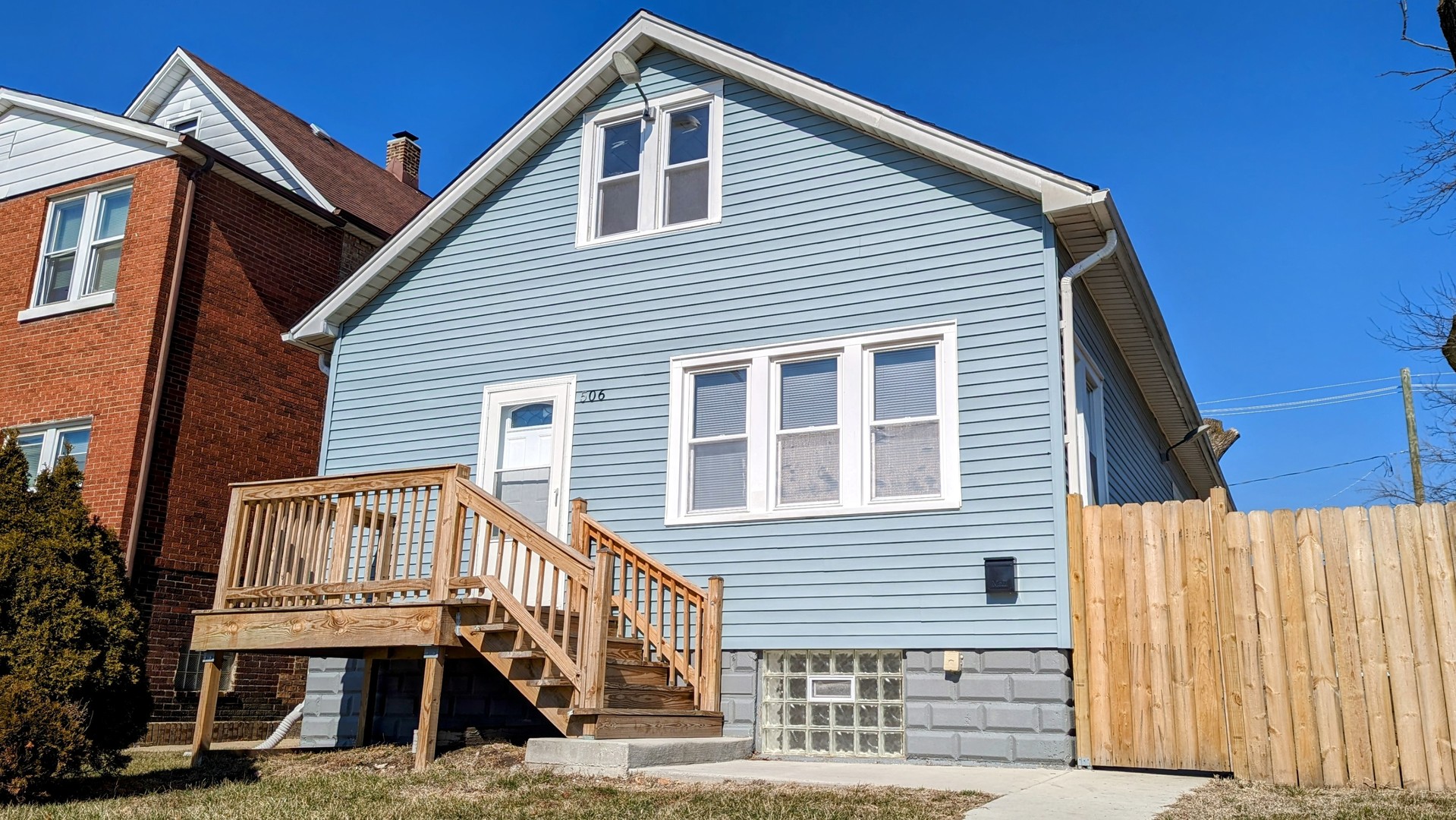 506 Pulaski Road Calumet City, IL 60409 - Photo 1 of 30 a front view of a house with a balcony