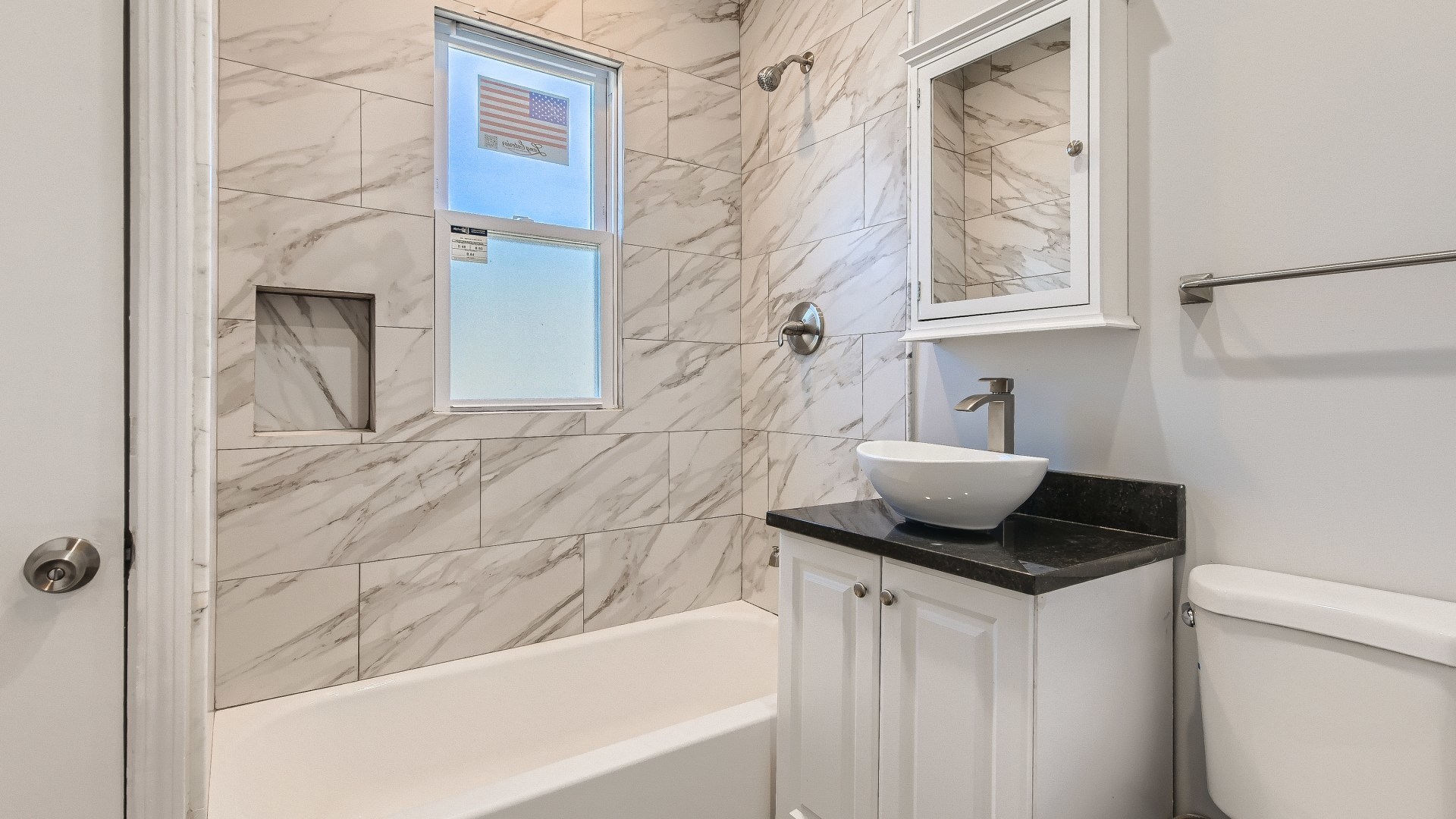 506 Pulaski Road Calumet City, IL 60409 - Photo 12 of 30 a bathroom with a granite countertop sink a mirror and shower