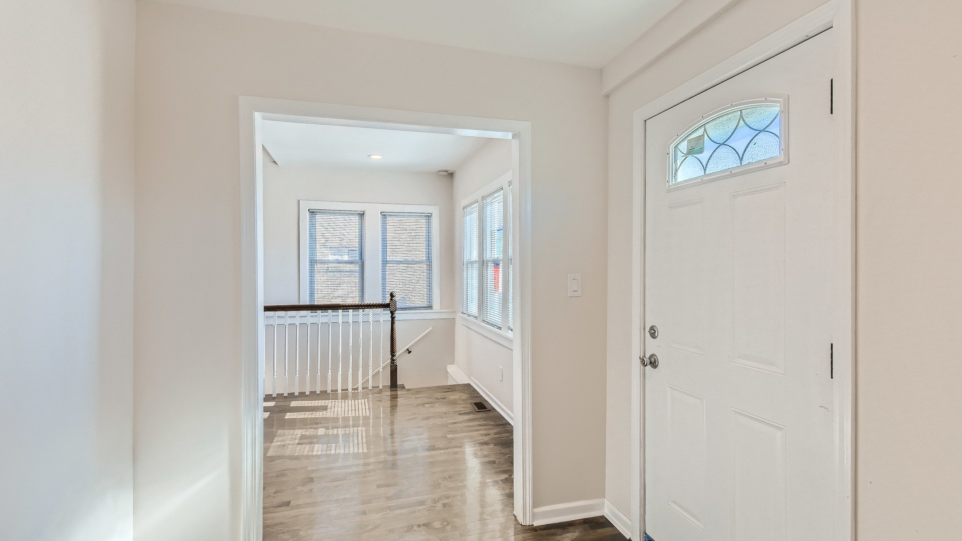 506 Pulaski Road Calumet City, IL 60409 - Photo 2 of 30 a view of a hallway with wooden floor and cabinet
