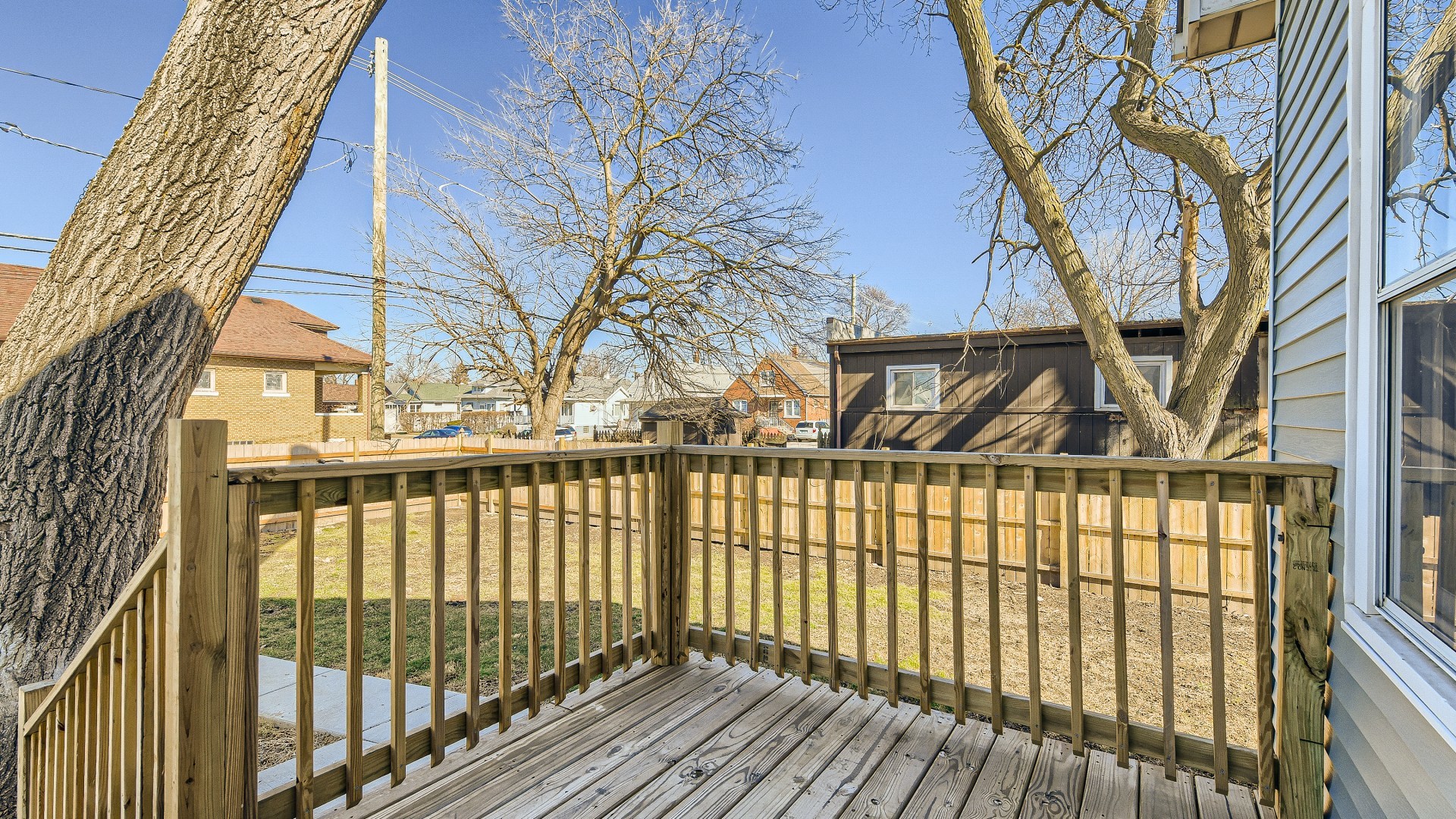 506 Pulaski Road Calumet City, IL 60409 - Photo 24 of 30 a view of a brick house with large trees