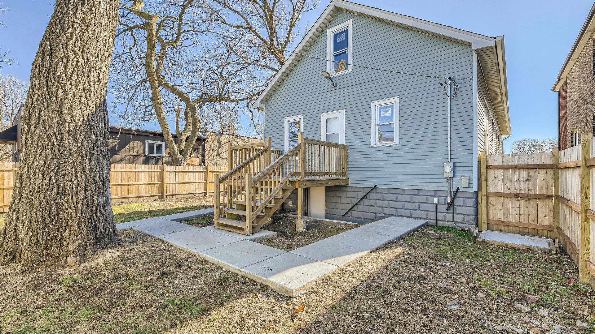 506 Pulaski Road Calumet City, IL 60409 - Photo 26 of 30 a view of a house with a wooden fence