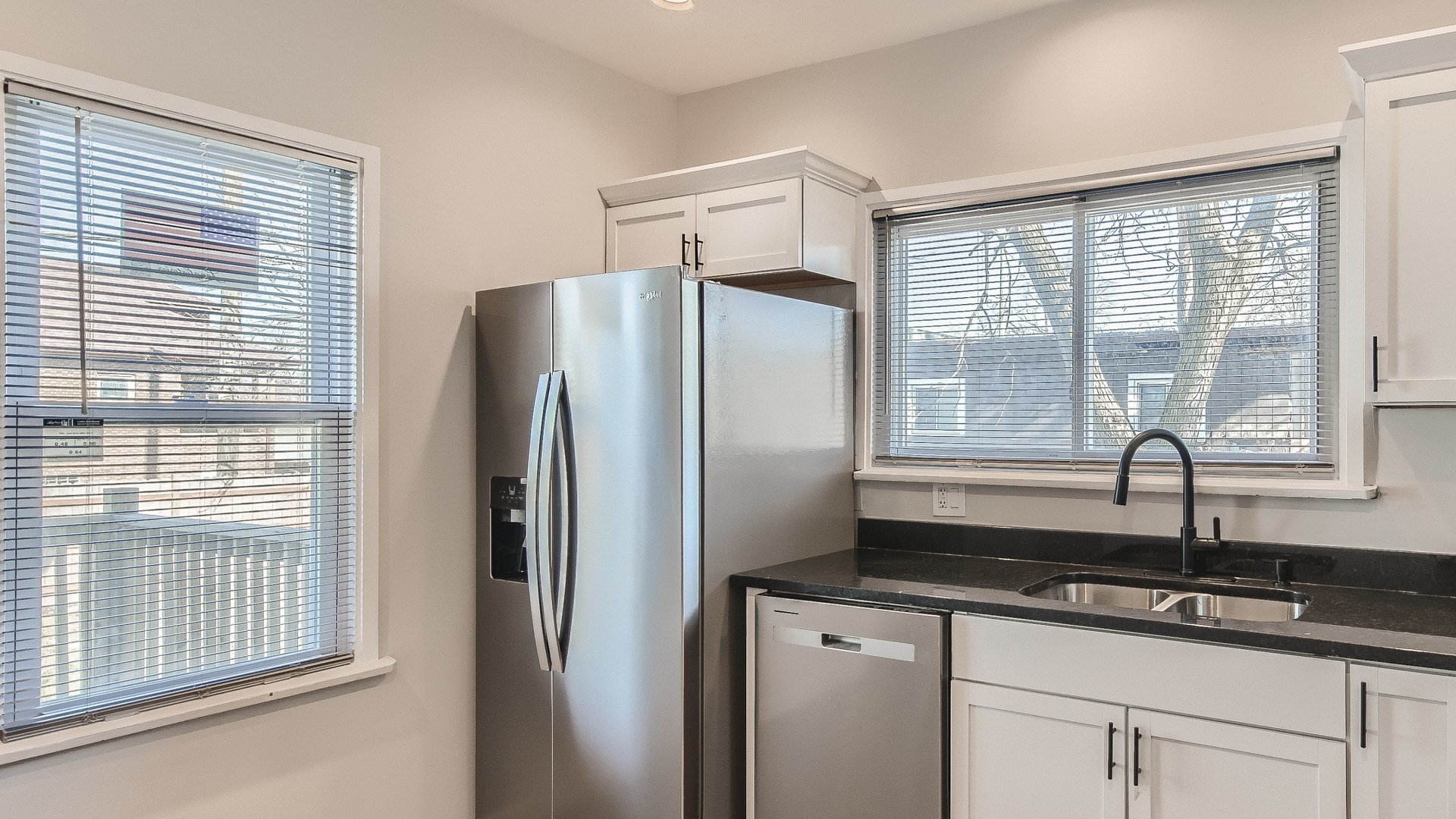 506 Pulaski Road Calumet City, IL 60409 - Photo 9 of 30 a kitchen with stainless steel appliances granite countertop a refrigerator and a sink