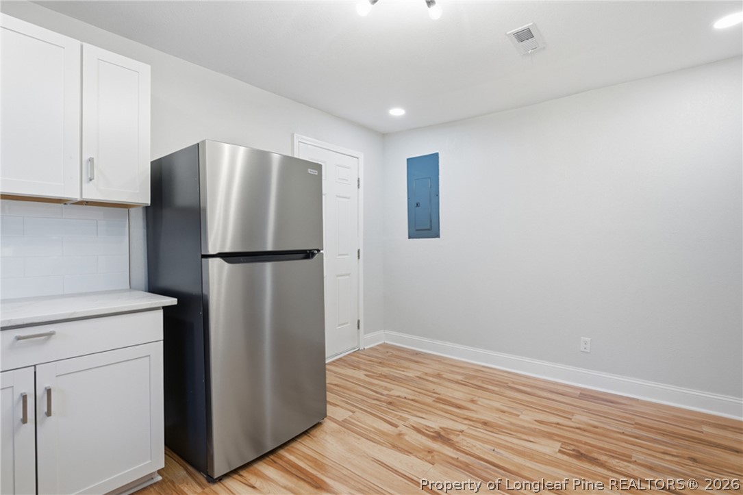 190 Payton Place Road Lumber Bridge, NC 28357 - Photo 13 of 43 a kitchen with metallic refrigerator freezer and a dishwasher