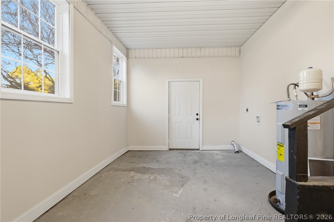 190 Payton Place Road Lumber Bridge, NC 28357 - Photo 17 of 43 a view of hallway with washer and dryer