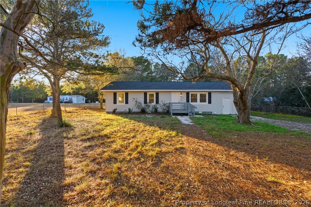 190 Payton Place Road Lumber Bridge, NC 28357 - Photo 2 of 43 a view of a house with a yard