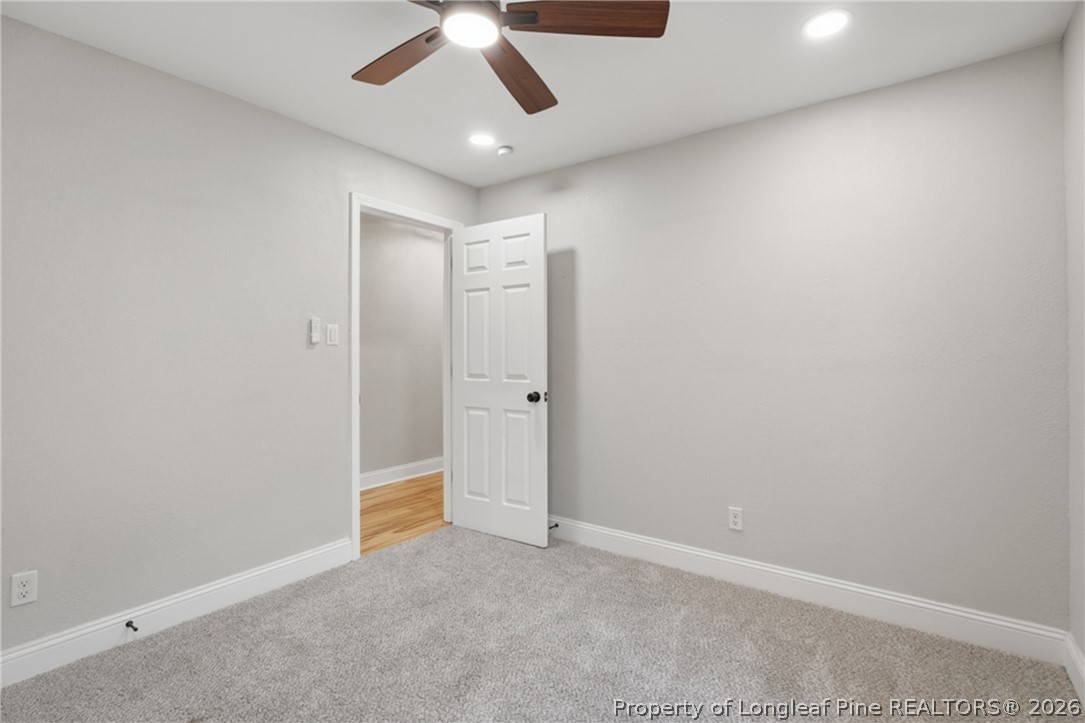 190 Payton Place Road Lumber Bridge, NC 28357 - Photo 21 of 43 an empty room with ceiling fan and window