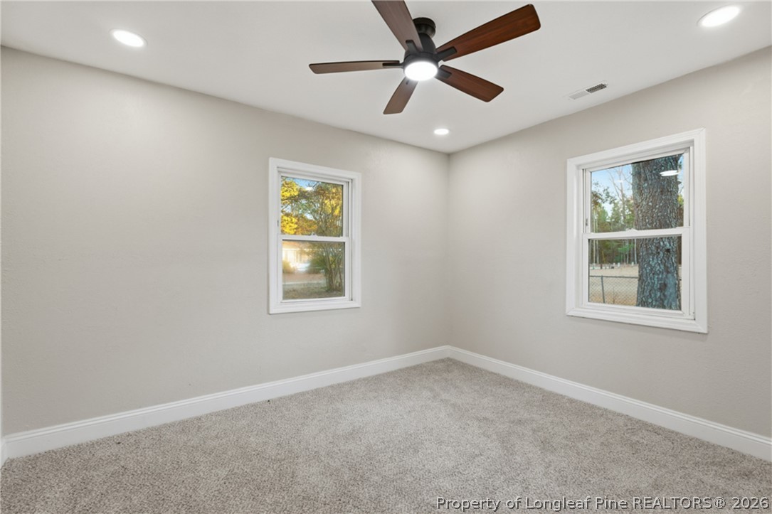 190 Payton Place Road Lumber Bridge, NC 28357 - Photo 31 of 43 an empty room with windows and fan