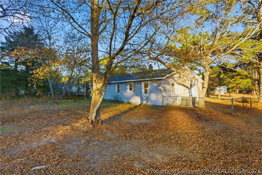 190 Payton Place Road Lumber Bridge, NC 28357 - Photo 41 of 43 a view of house with trees in the background