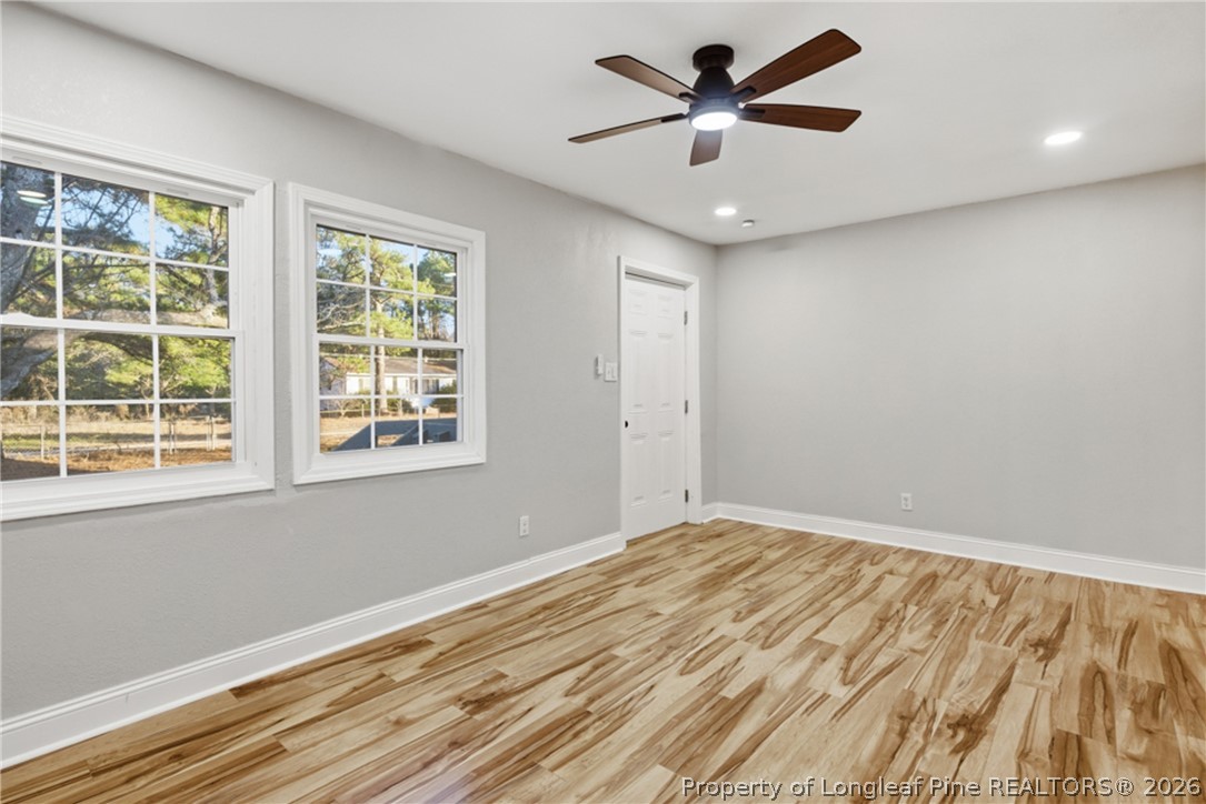 190 Payton Place Road Lumber Bridge, NC 28357 - Photo 10 of 43 a view of a room with a ceiling fan and a window