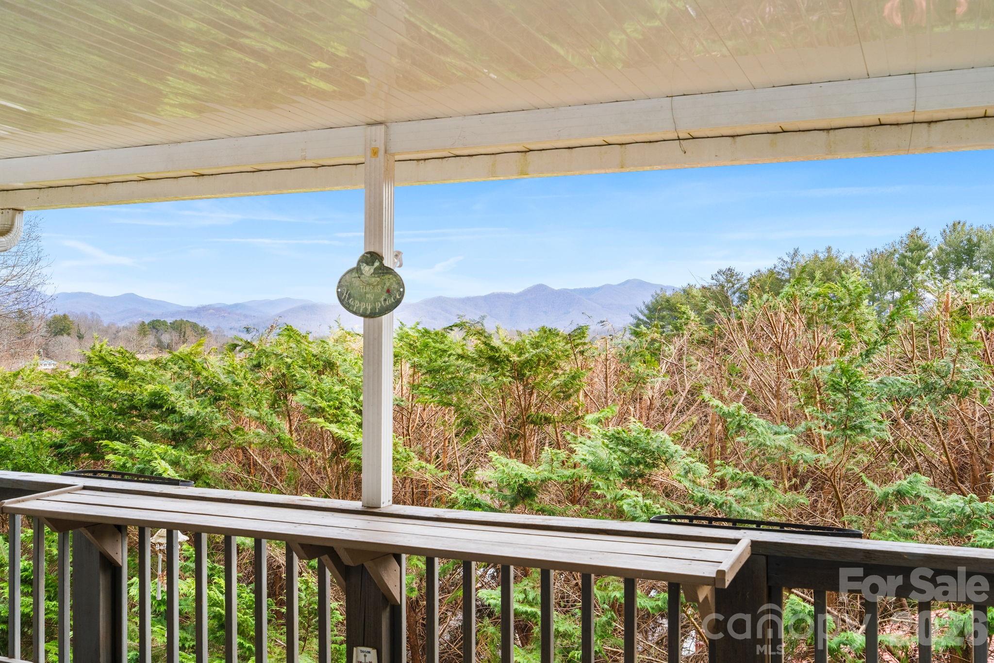 210 Ledbetter Lane Franklin, NC 28734 - Photo 2 of 32 a view of a balcony with chairs