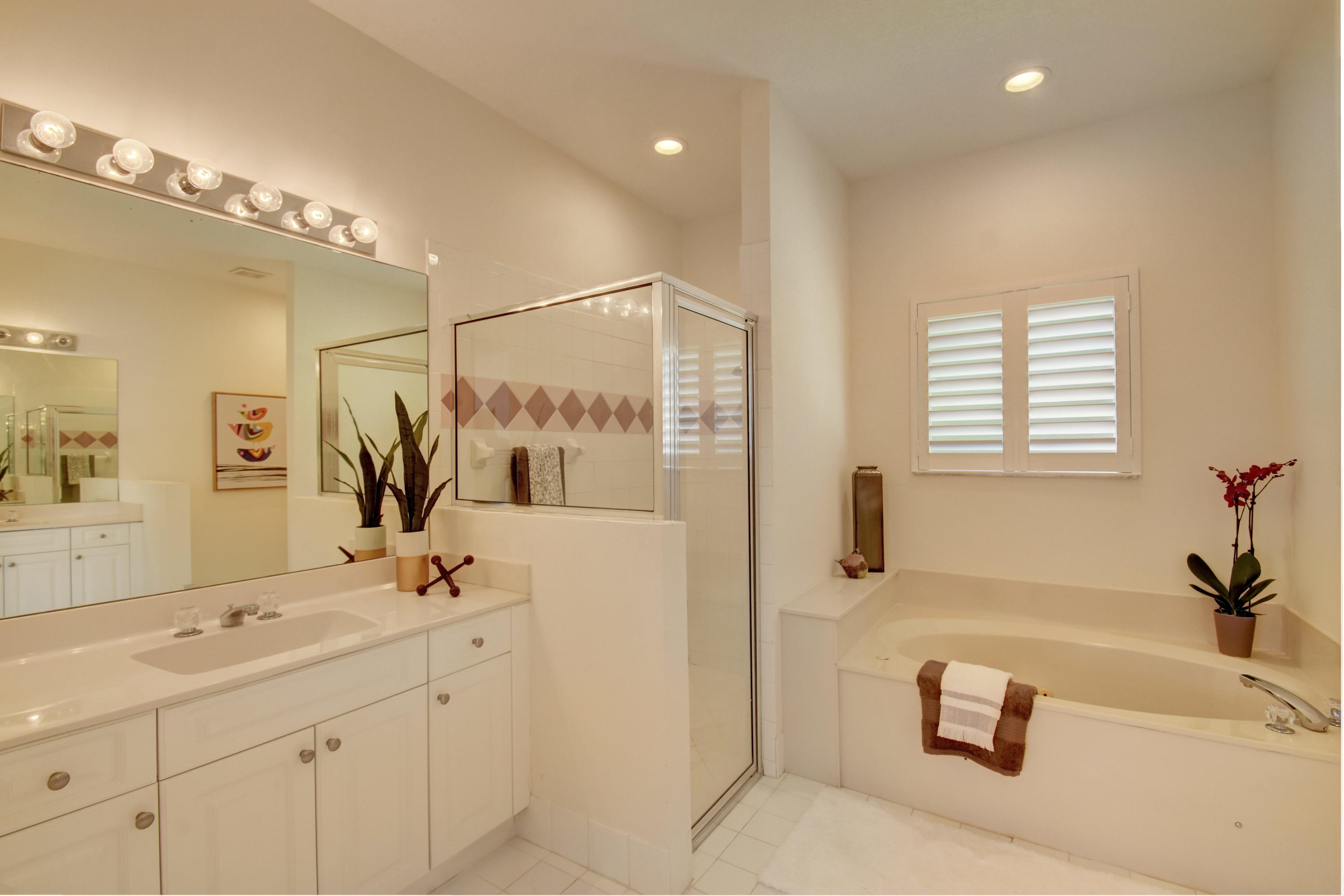 7201 Northwest Turtle Walk Boca Raton, FL 33487 - Photo 17 of 39 His/hers vanities, big shower and tub