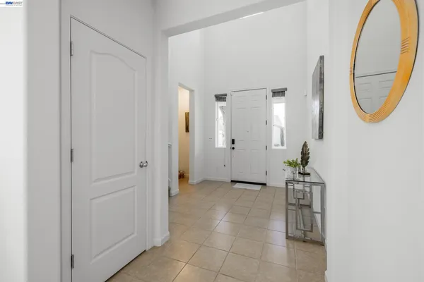 a view of a hallway with front door