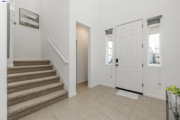 a view of entryway with stairs