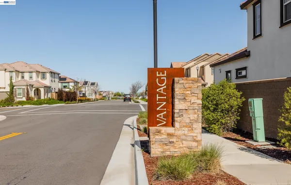 a view of a city with an ocean