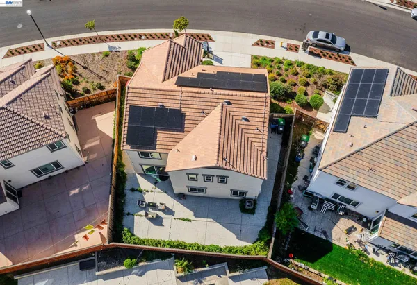 a aerial view of a house with a swimming pool
