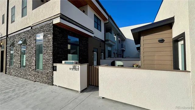 a view of a building with refrigerator and stove