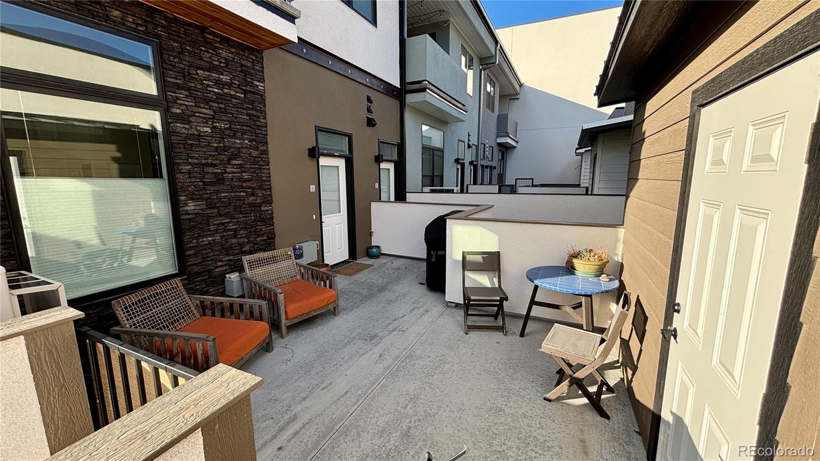 116 Old Stage Road, Unit B Salida, CO 81201 - Photo 15 of 20 a balcony with furniture and wooden floor