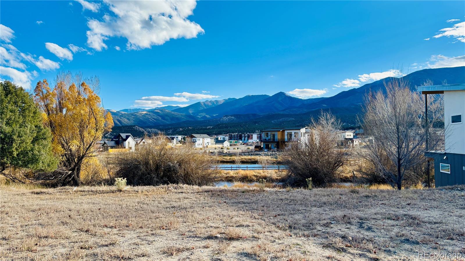 116 Old Stage Road, Unit B Salida, CO 81201 - Photo 18 of 20 a view of a house with a yard and sitting area