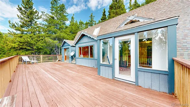 a view of kitchen with furniture and flat screen tv