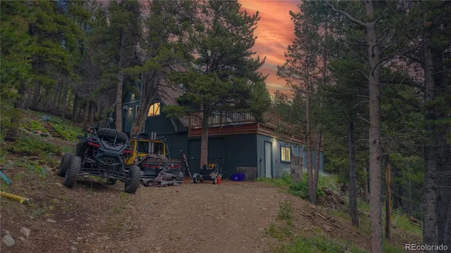 a view of mountain with green field