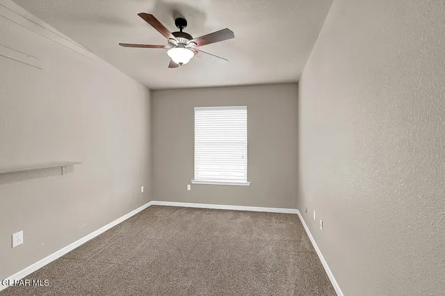 a view of a living room with furniture
