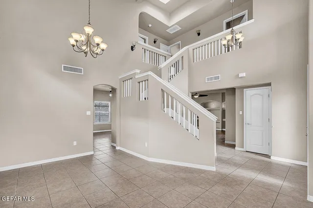 a kitchen with sink a stove and cabinets