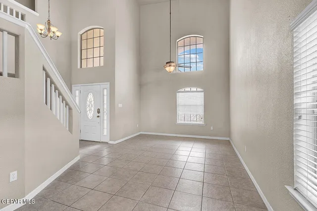 a kitchen with a sink stainless steel appliances and cabinets