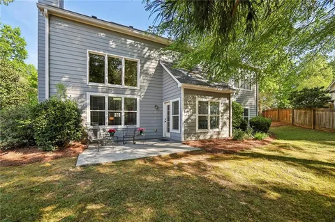 a front view of a house with a patio