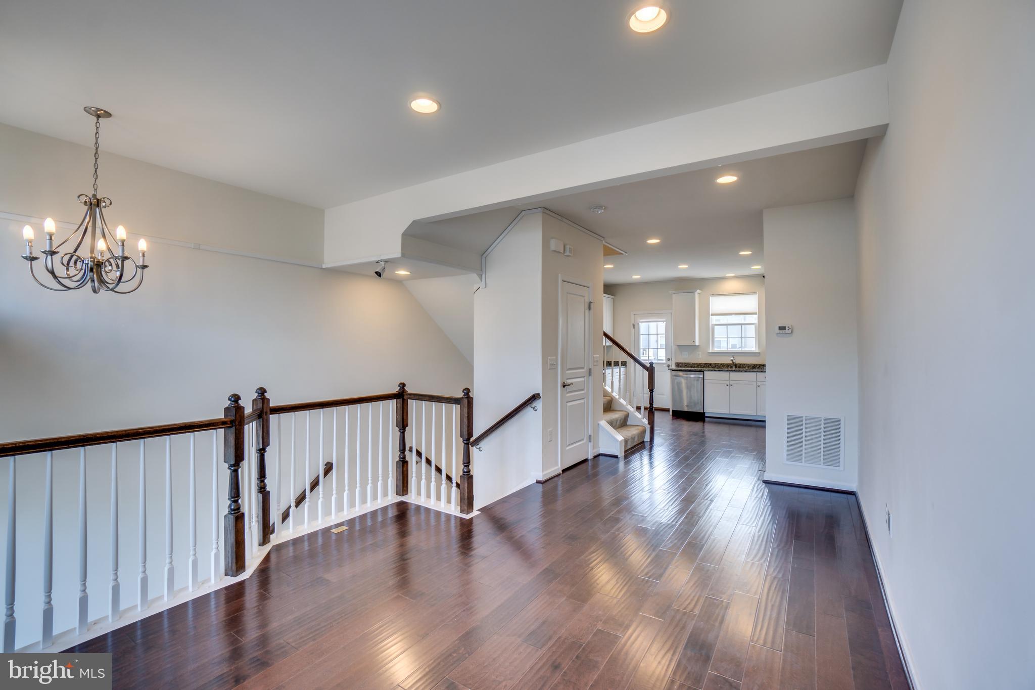8385 Scotland Loop, Unit 68 Manassas, VA 20109 - Photo 10 of 30 Living room with open foyer