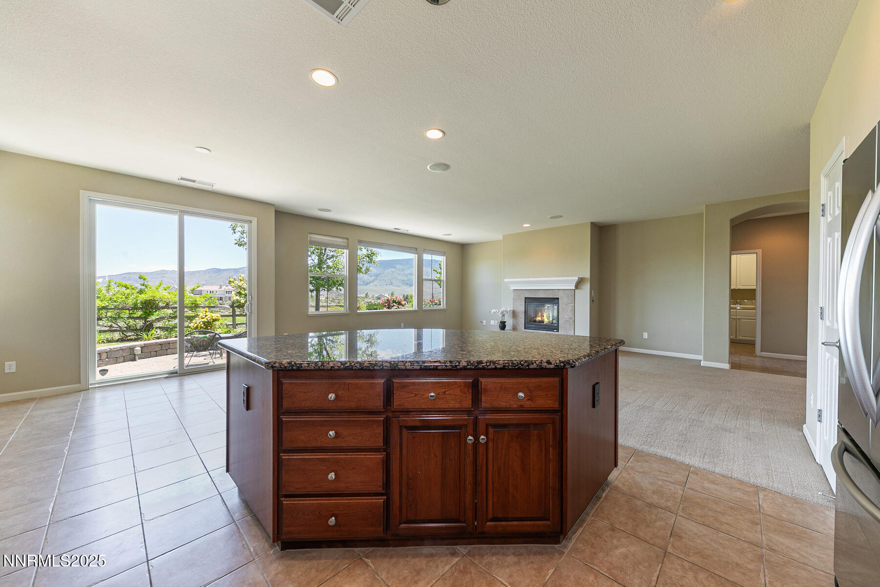 8890 Chipshot Trail Reno, NV 89523 - Photo 20 of 36 a kitchen with granite countertop a sink and cabinets