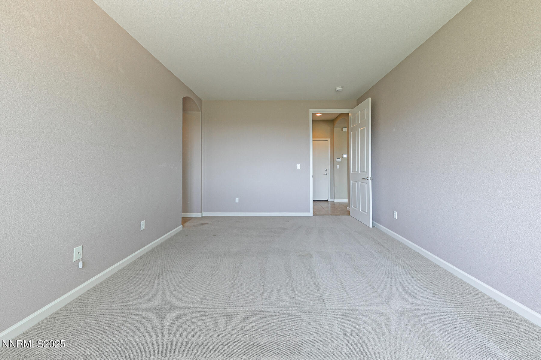 8890 Chipshot Trail Reno, NV 89523 - Photo 22 of 36 a view of an empty room with a window
