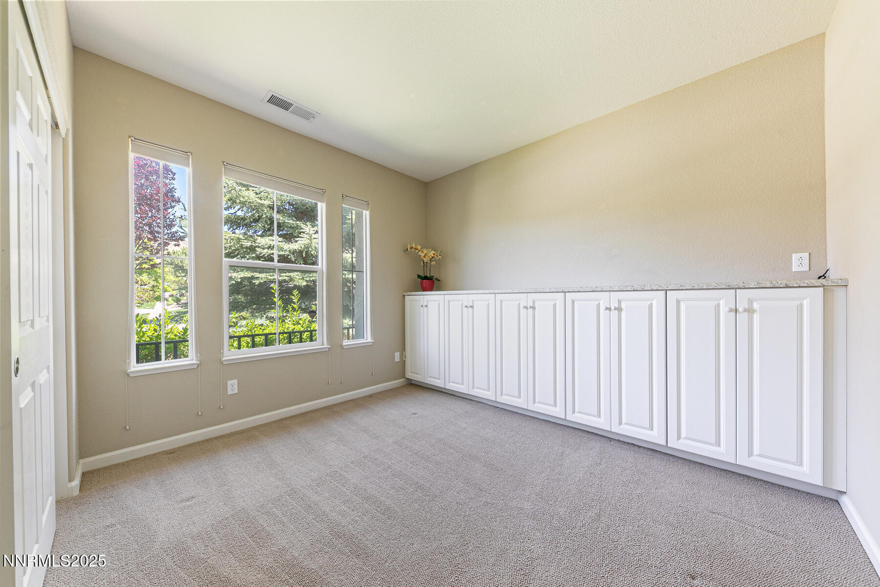 8890 Chipshot Trail Reno, NV 89523 - Photo 25 of 36 a view of a livingroom with a window