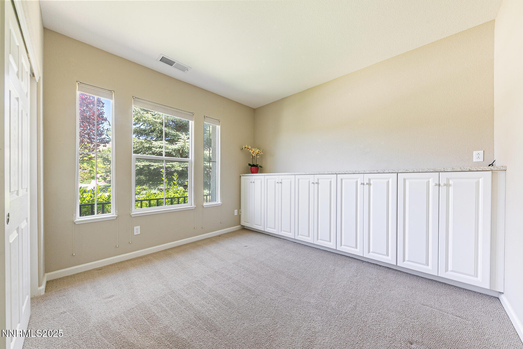 8890 Chipshot Trail Reno, NV 89523 - Photo 28 of 36 a view of a livingroom with a window